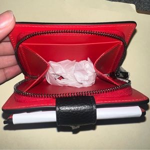 Brand New, no flaws Christian Louboutin mini wallet.